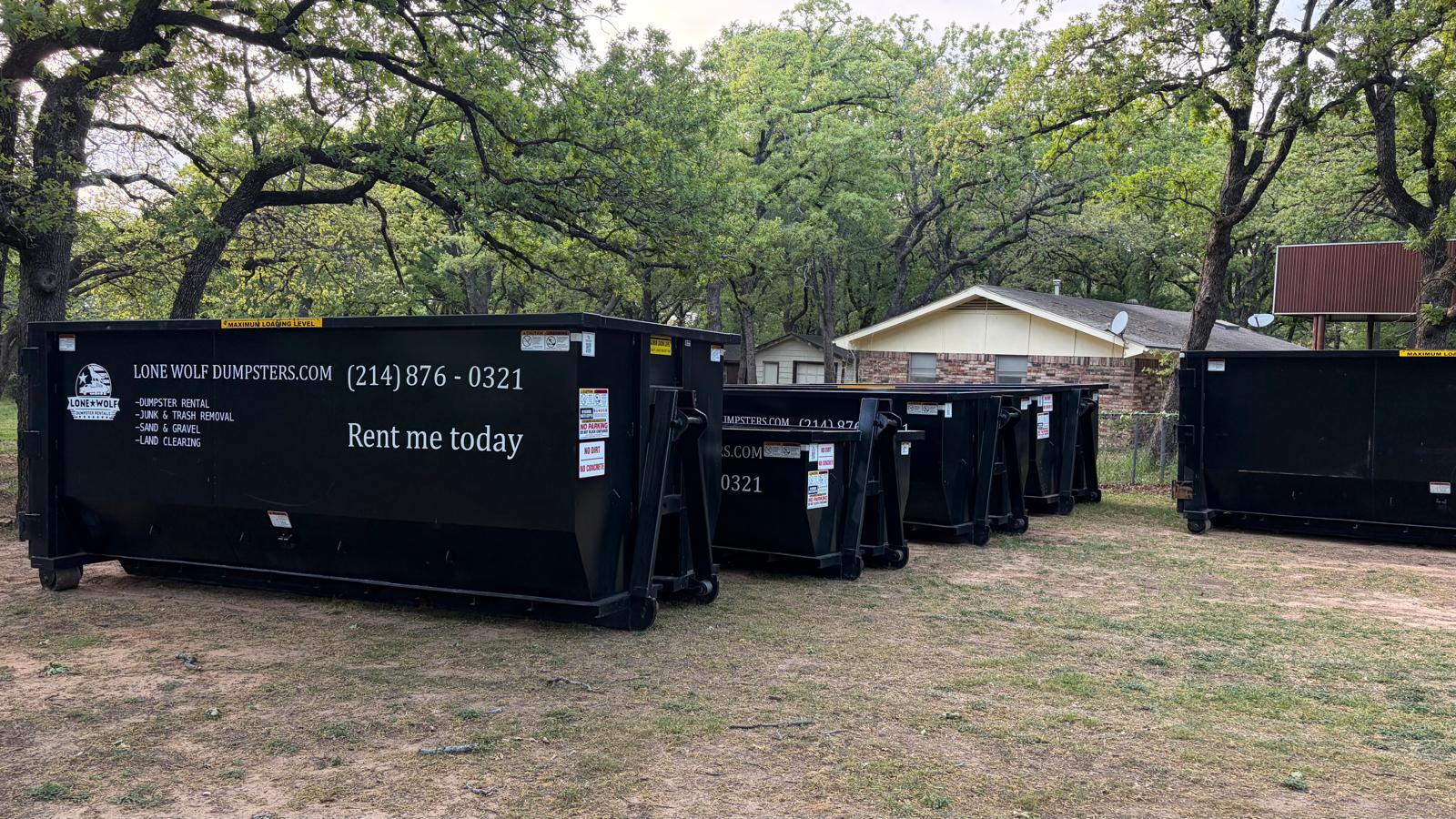 Lone Wolf Dumpsters roll-off dumpster rental truck with 15, 20 and 25-yard containers serving DFW - Dallas Fort Worth