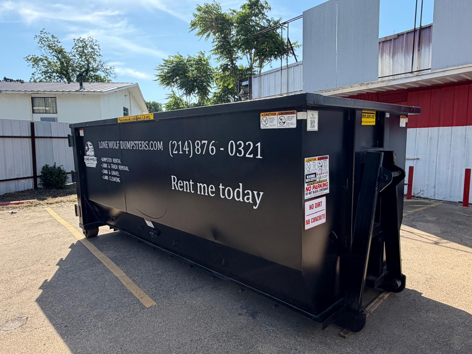 Contractor roll-off dumpster on a construction job site in Dallas-Fort Worth