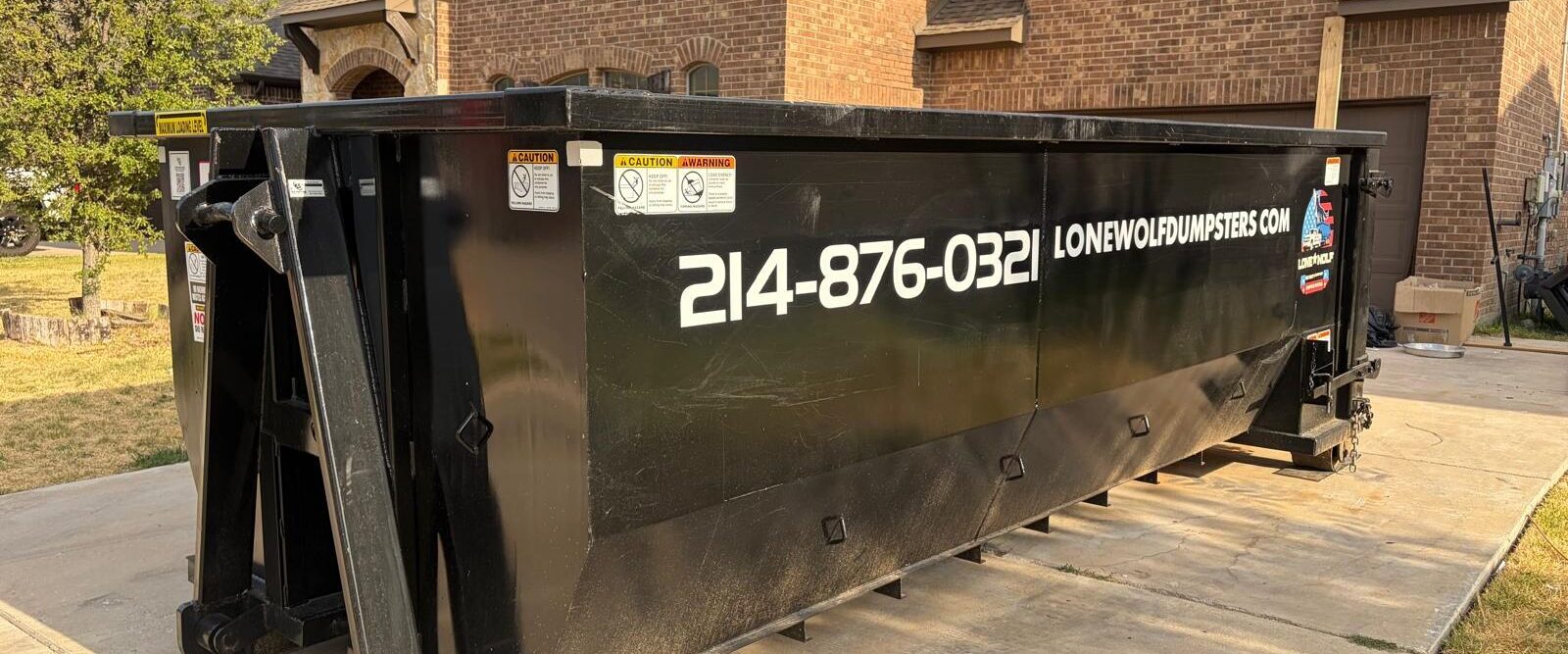 Lone Wolf Dumpsters roll-off dumpster ready for direct owner-operator dispatch across 21 DFW cities