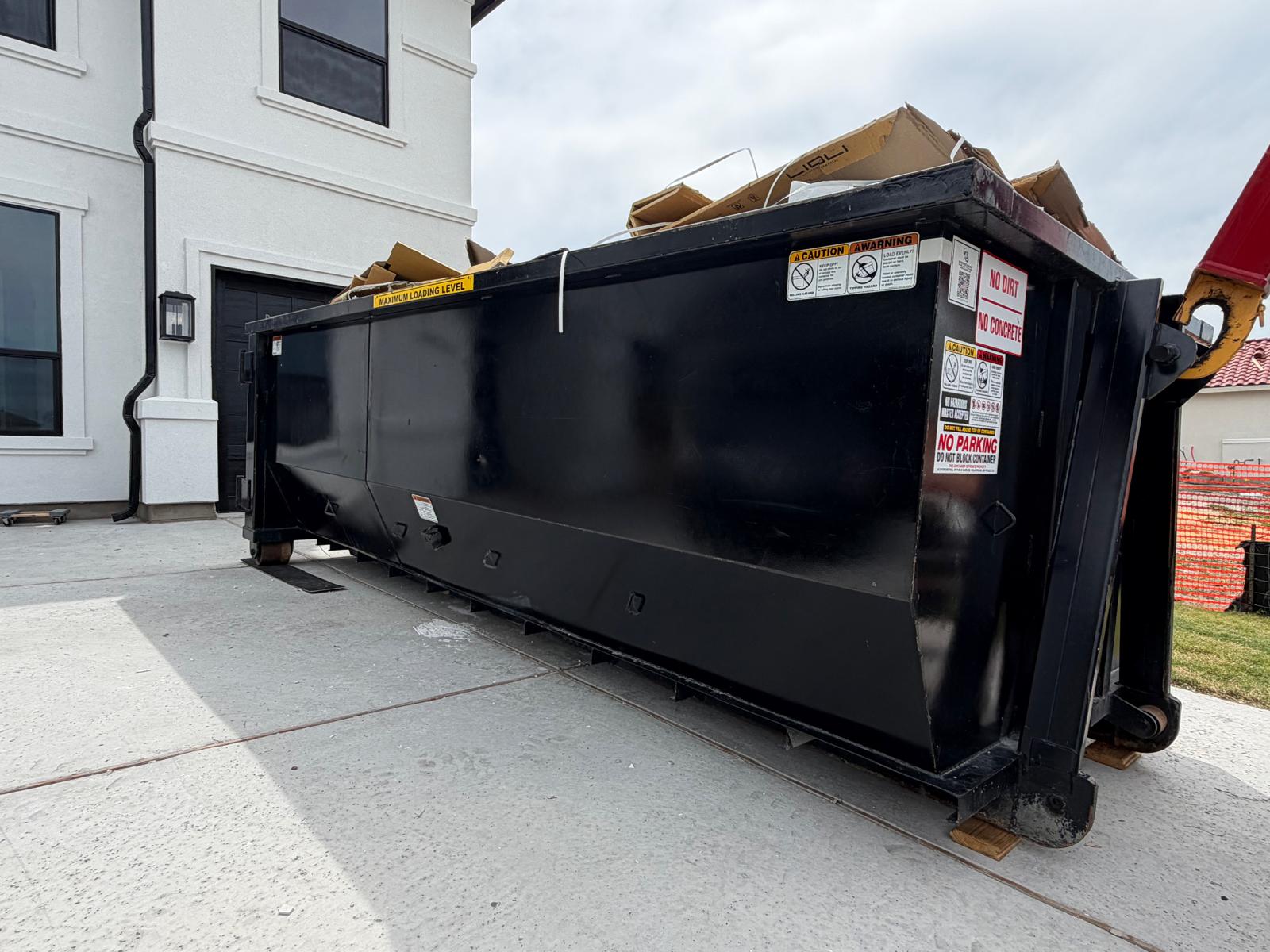 Roll-off dumpster rental delivery in Carrollton, TX