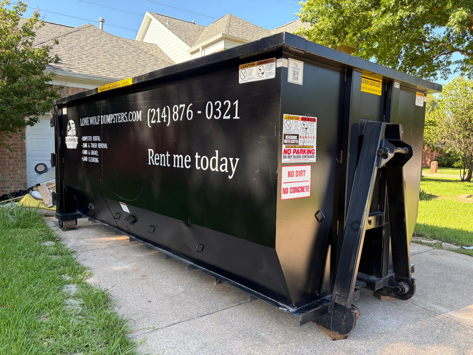 25 yard roll-off dumpster rental at a commercial job site in Dallas-Fort Worth